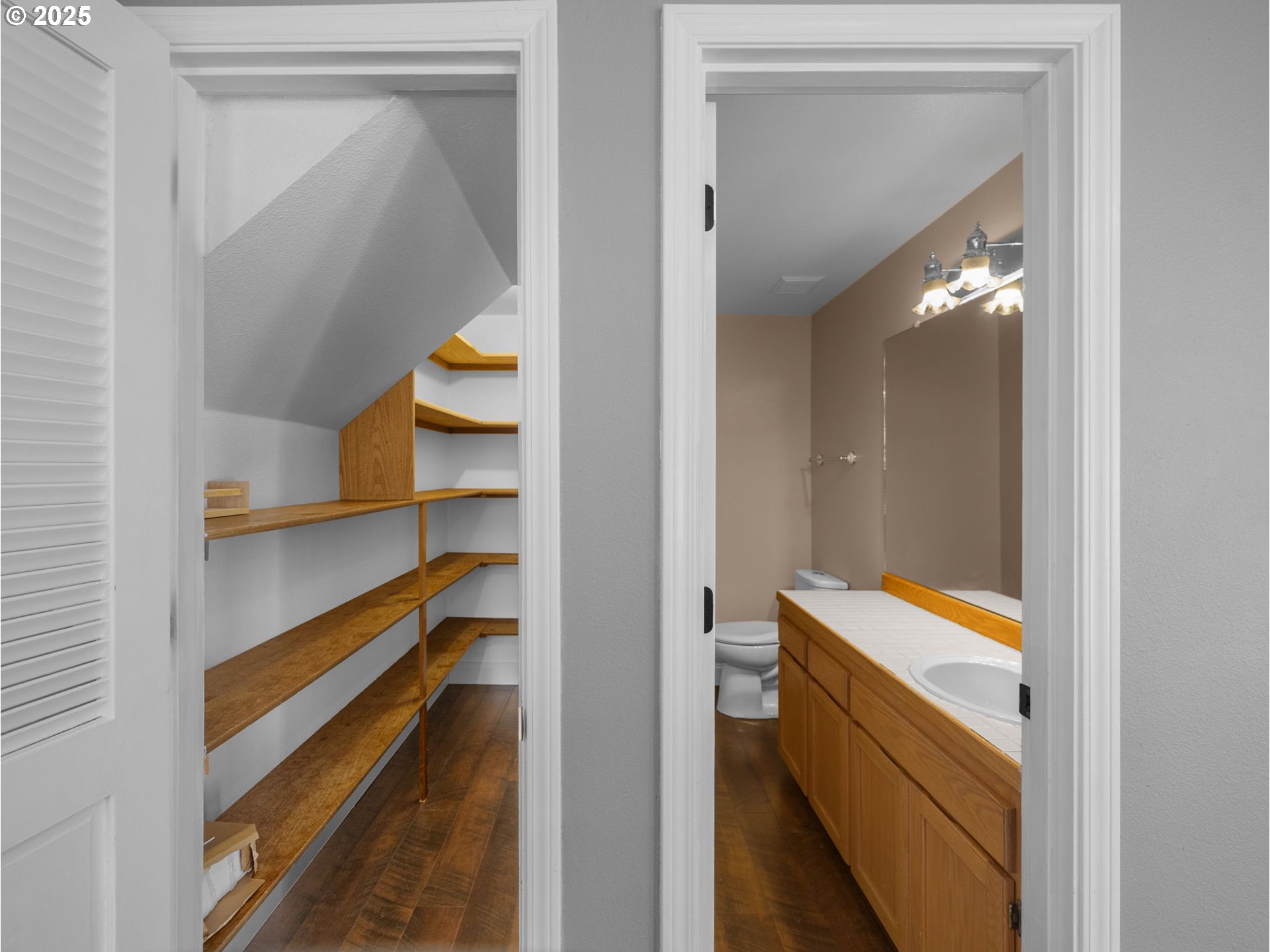 2510 Southwest Lillyben Court Gresham, OR 97080 - Photo 12 of 26 a bathroom with a light fixture and a sink