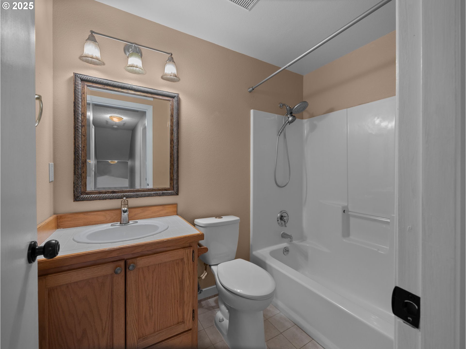 2510 Southwest Lillyben Court Gresham, OR 97080 - Photo 17 of 26 a bathroom with a sink toilet and shower