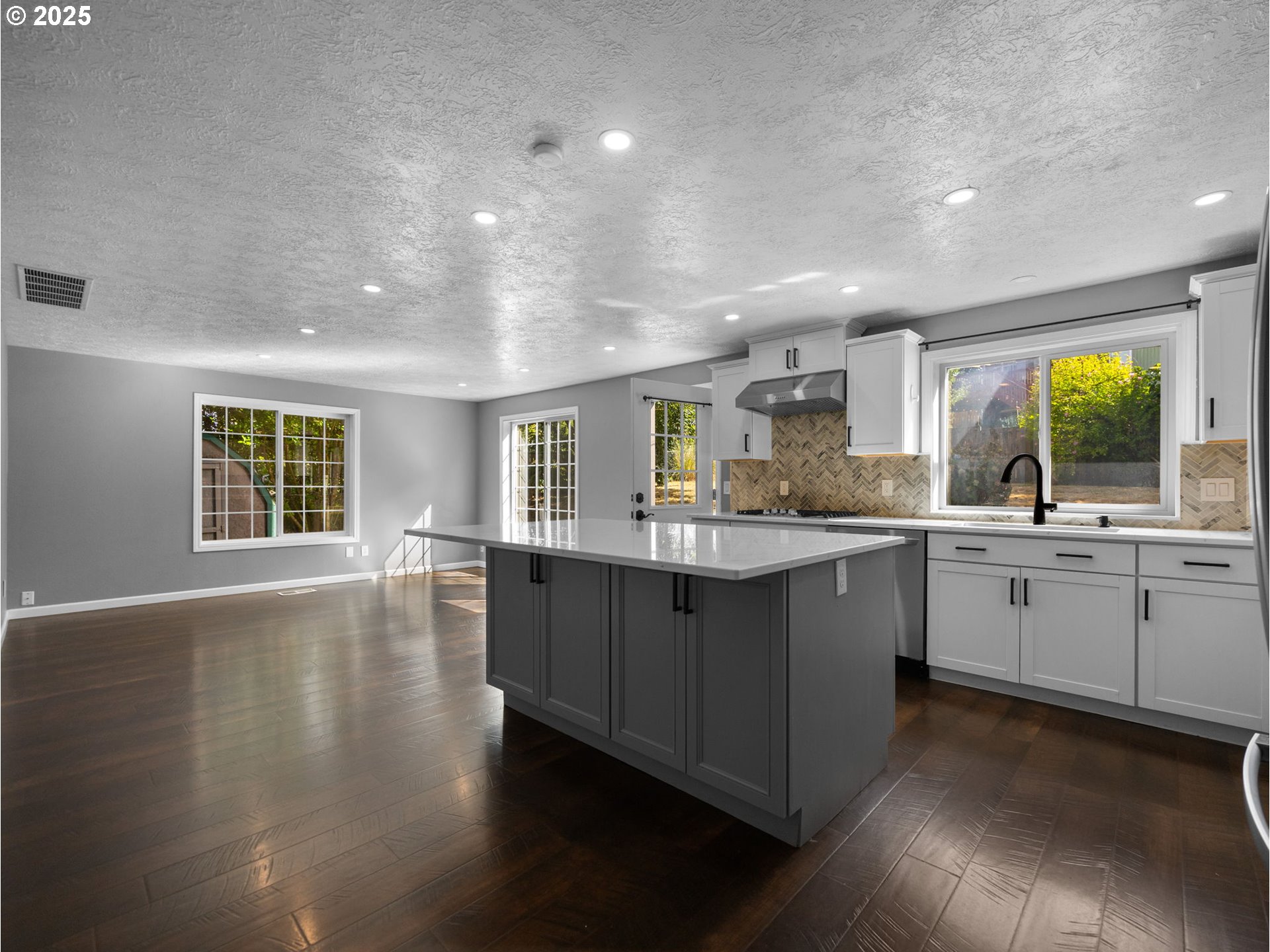 2510 Southwest Lillyben Court Gresham, OR 97080 - Photo 8 of 26 a large kitchen with lots of counter space and a sink