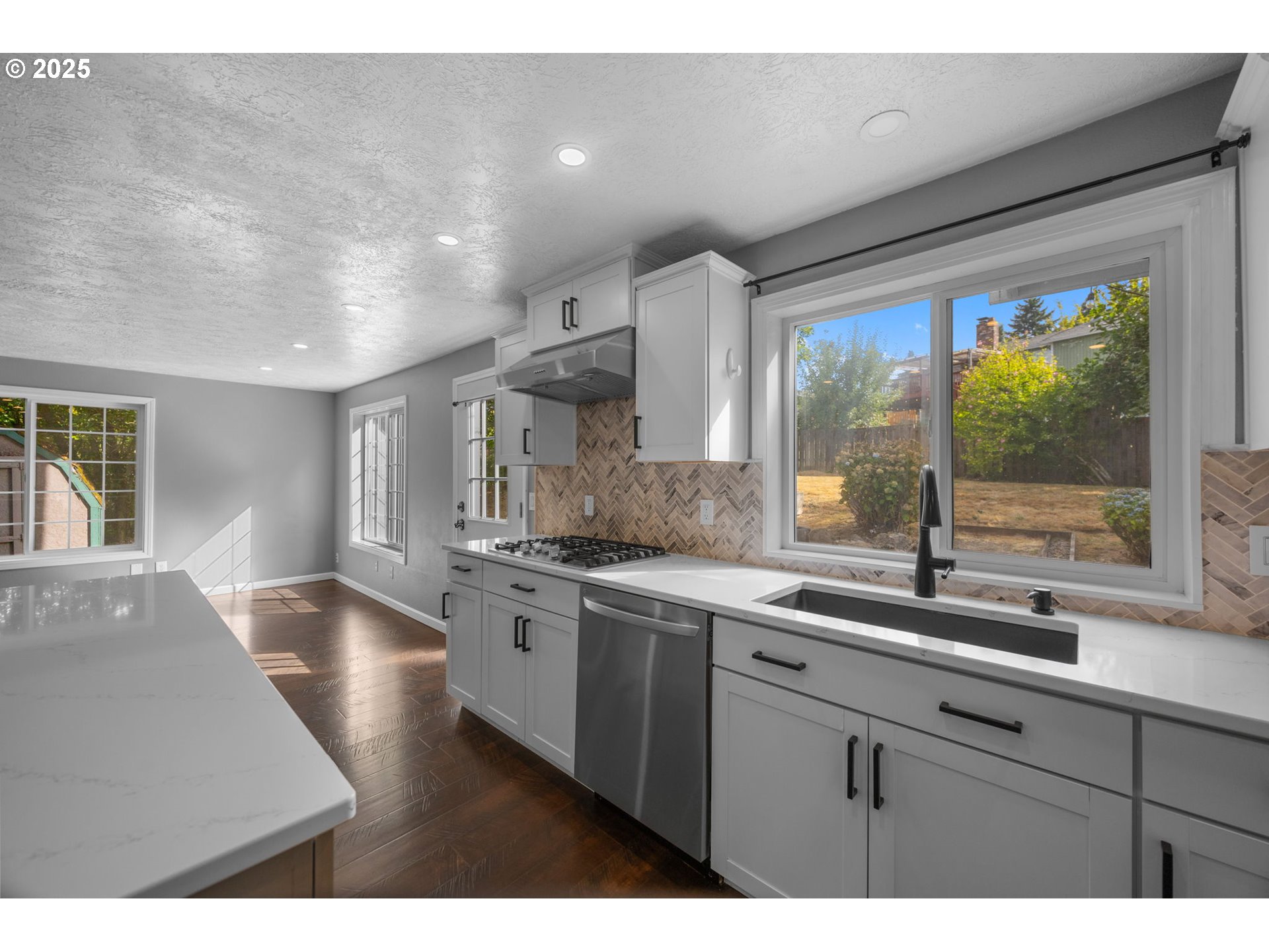2510 Southwest Lillyben Court Gresham, OR 97080 - Photo 9 of 26 a kitchen with a sink stove and cabinets