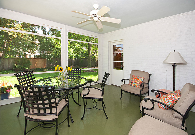 1004 Pontiac Road Wilmette, IL 60091 - Photo 13 of 28 a dining room with furniture and a floor to ceiling window