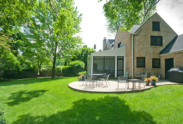 1004 Pontiac Road Wilmette, IL 60091 - Photo 27 of 28 a view of a chair and table in backyard of the house