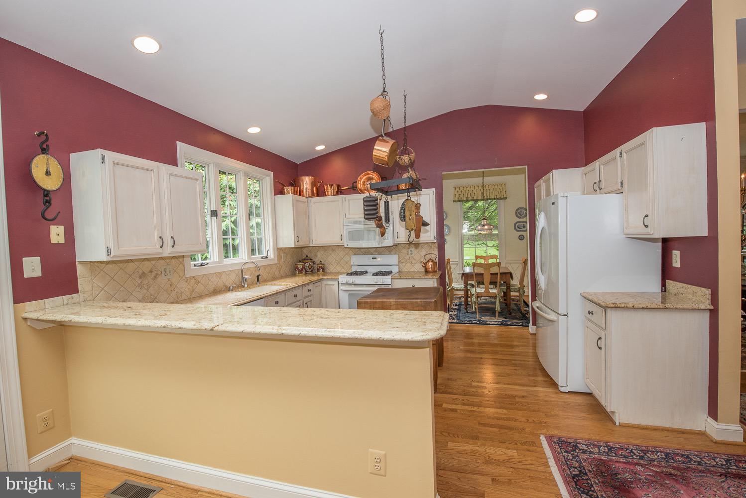 201 3 Rivers Court, Unit 101 Berwyn, PA 19312 - Photo 11 of 30 Kitchen with granite and butcher blocks