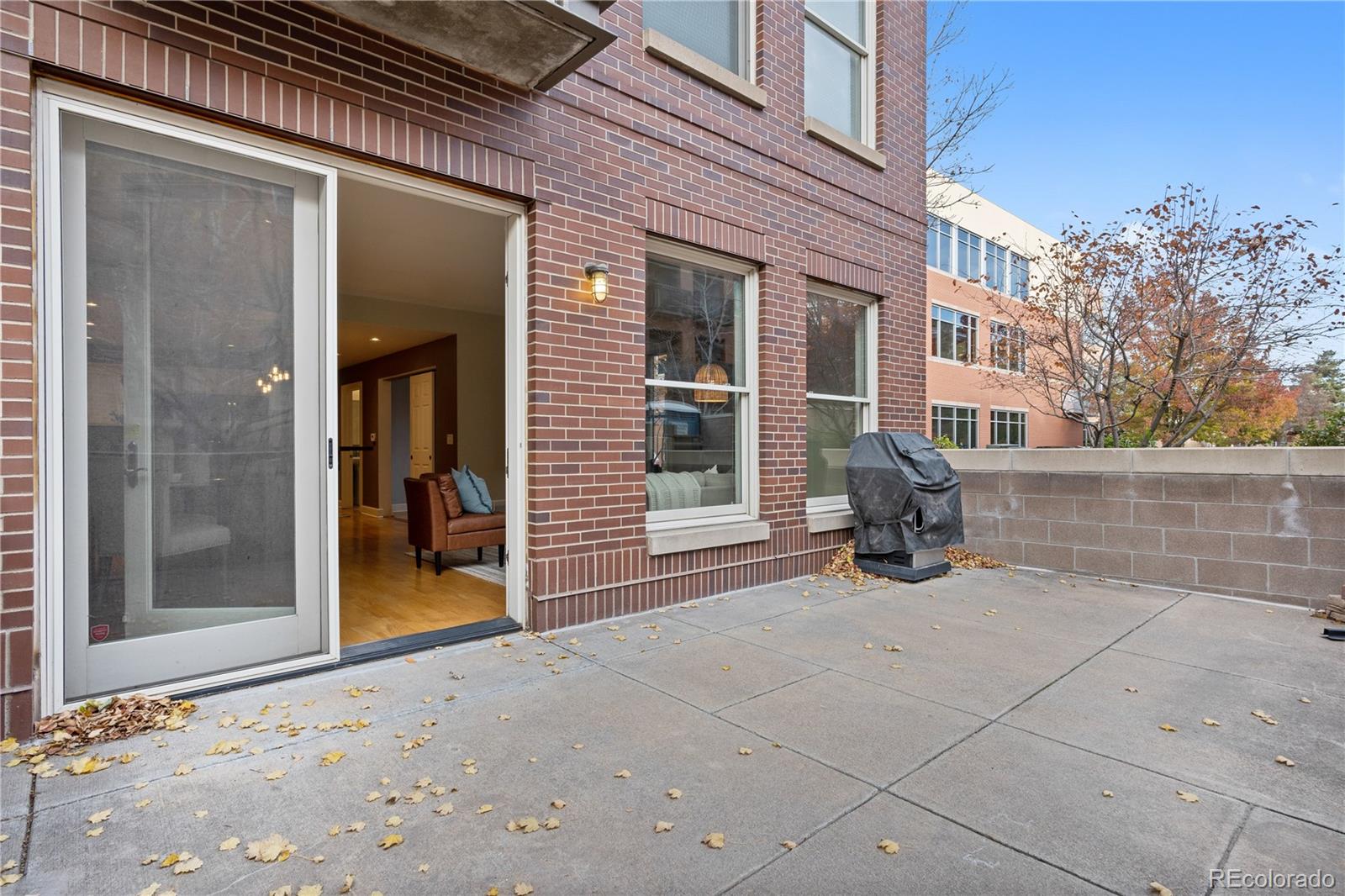 1630 North Clarkson Street, Unit 110 Denver, CO 80218 - Photo 32 of 36 a view of a door with a bench
