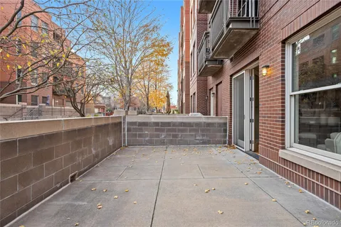 a view of a pathway along the building