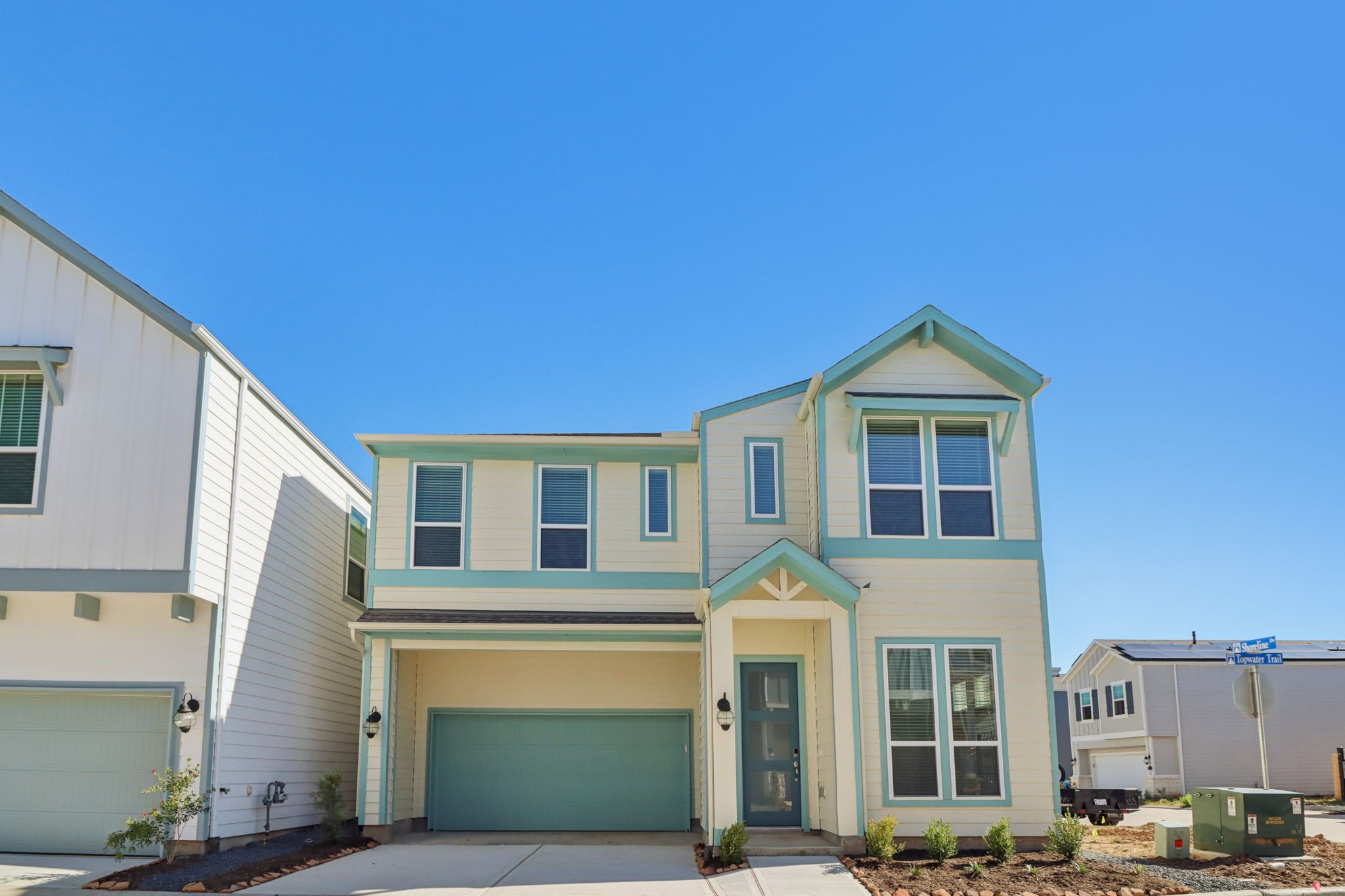 a front view of a house with parking