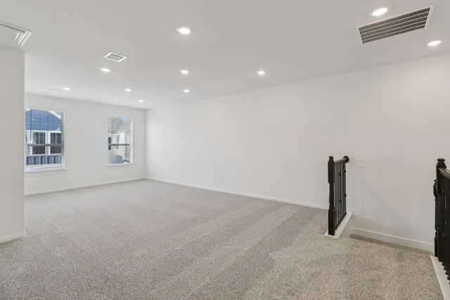 a view of a livingroom with a staircase