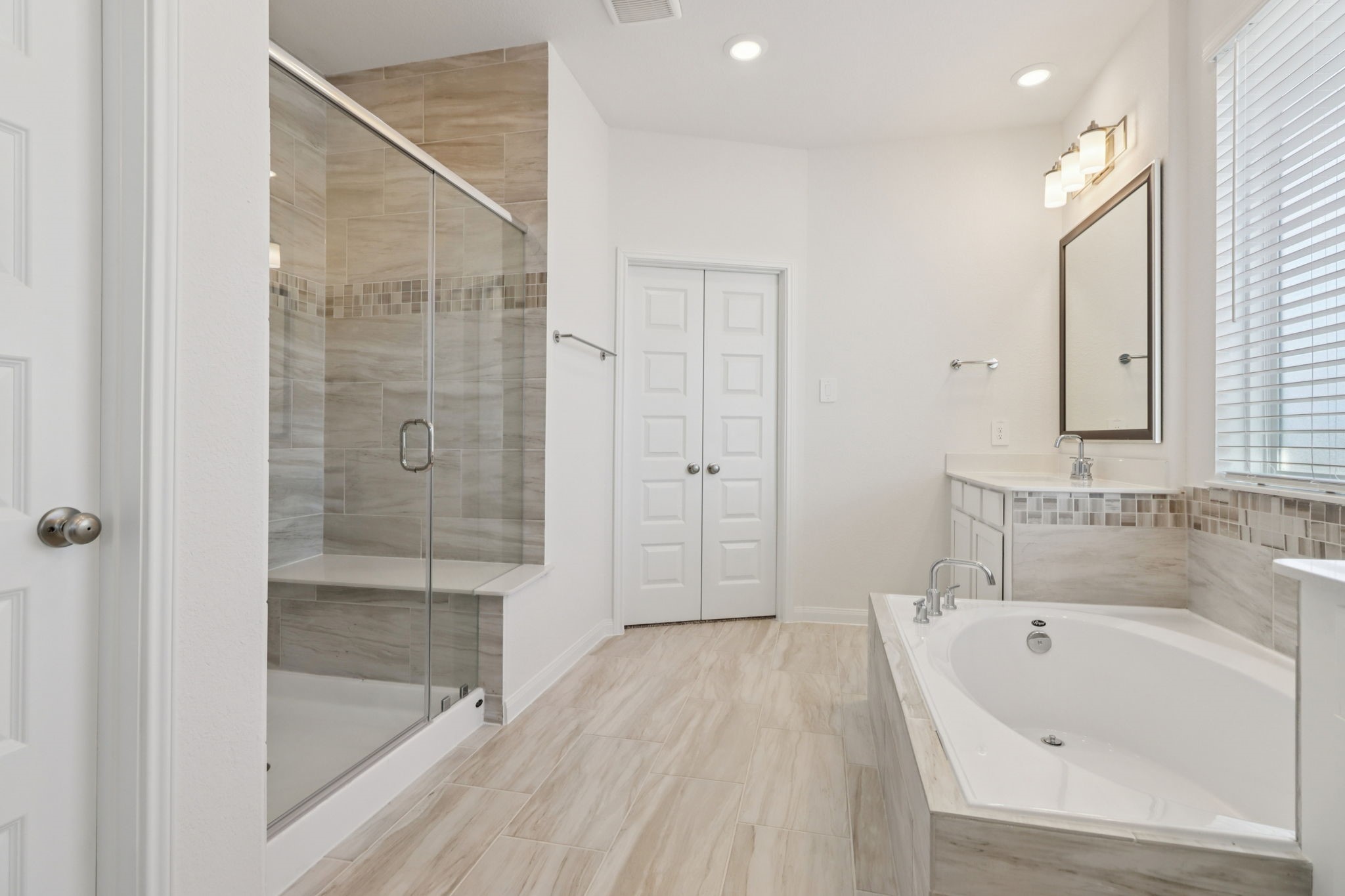 708 Topwater Trail Kemah, TX 77565 - Photo 37 of 43 a bathroom with a bathtub and a shower