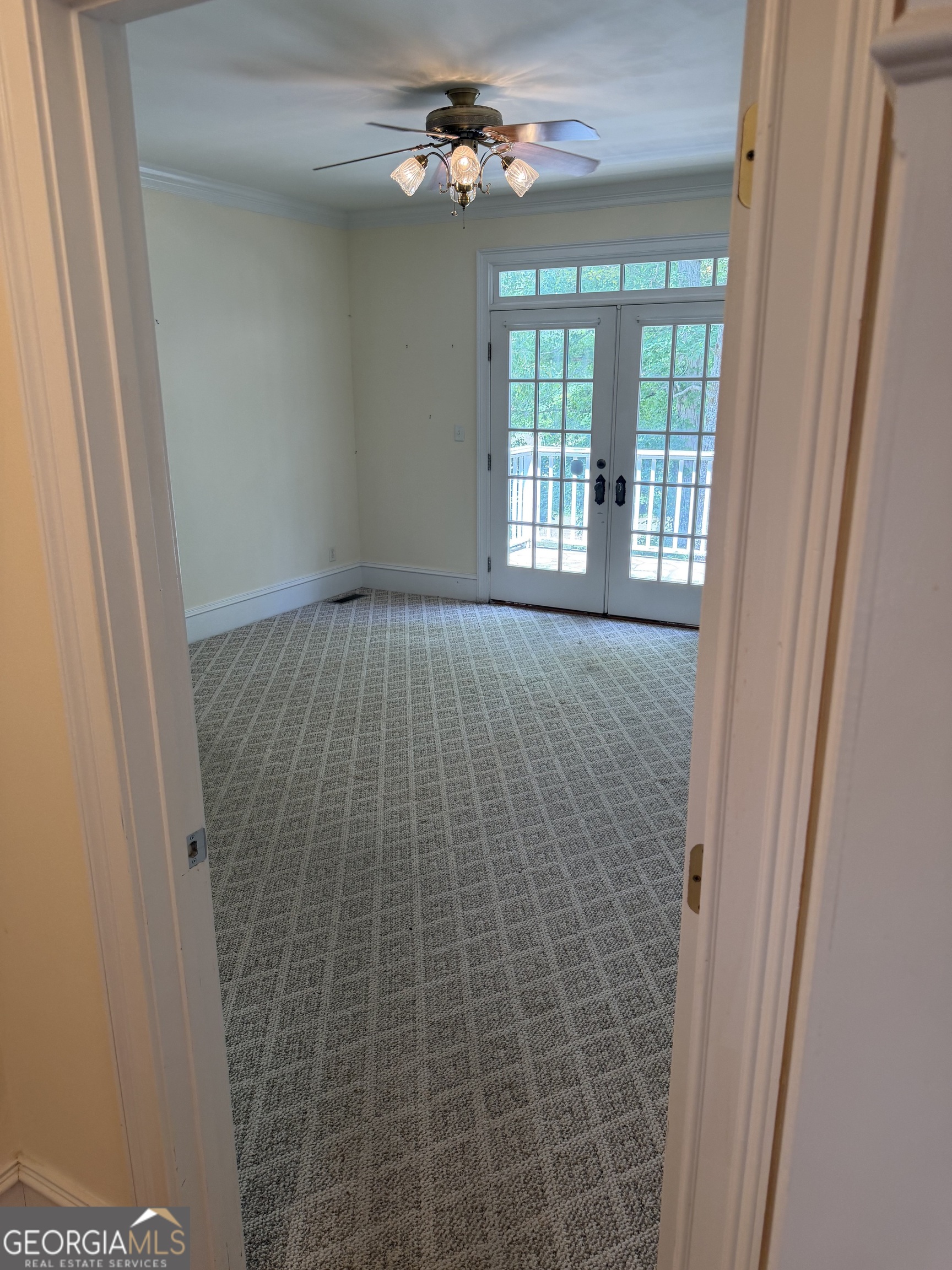 302 Norris Road Barnesville, GA 30204 - Photo 26 of 65 a view of an empty room with a window