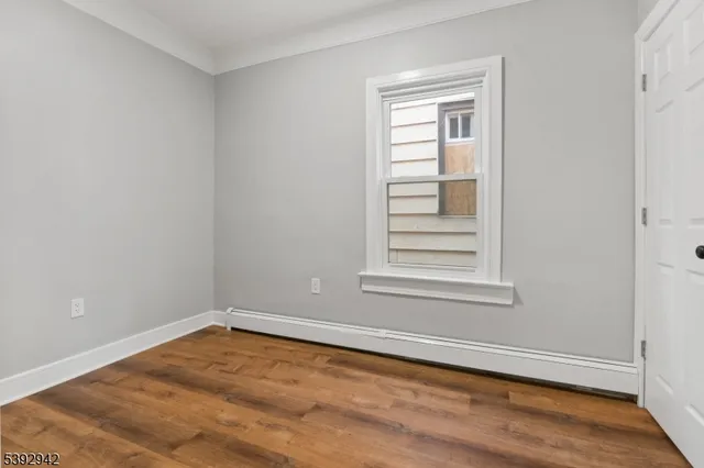 a view of a room that has a window in it