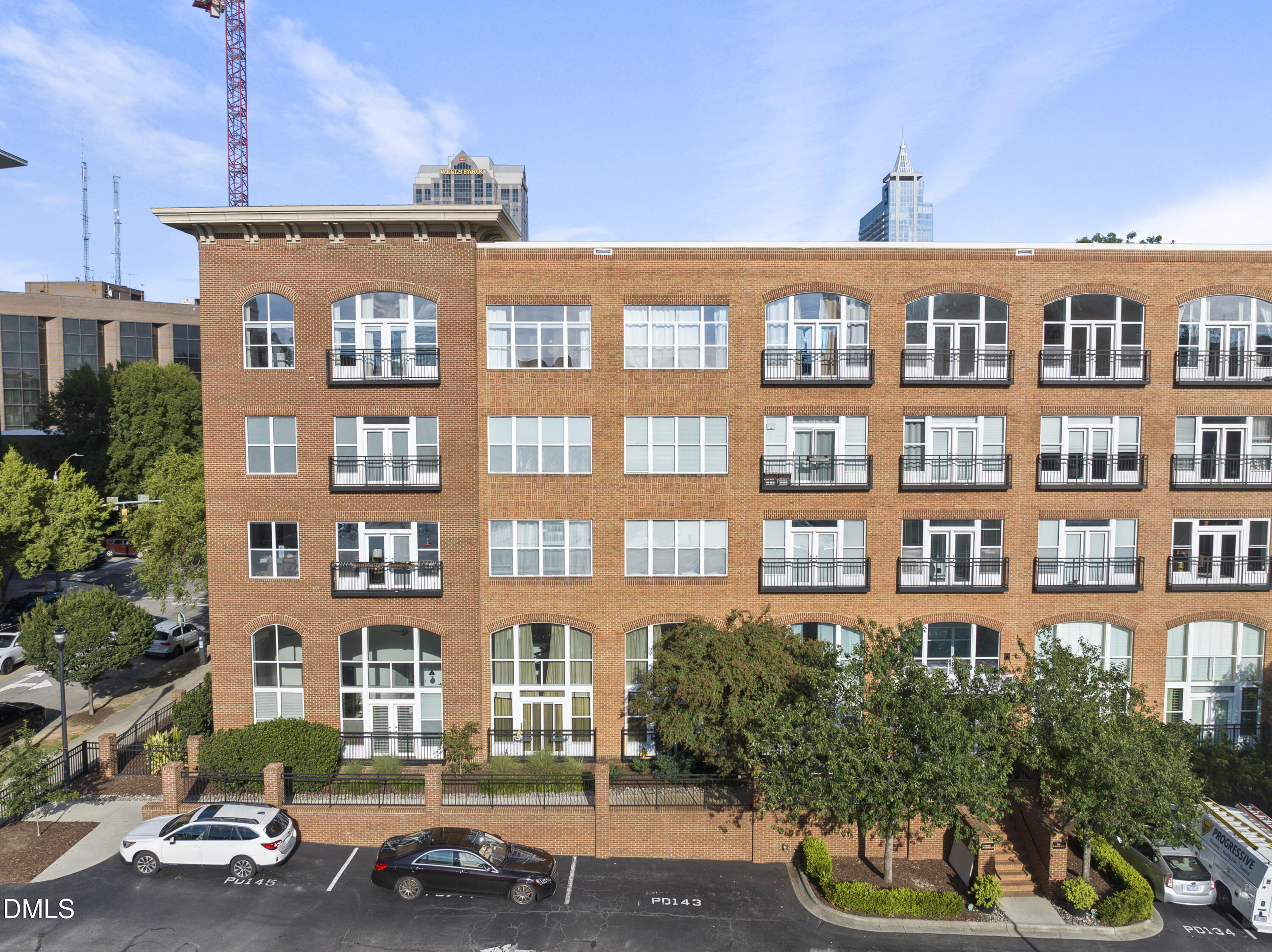 200 South Dawson Street, Unit 306 Raleigh, NC 27601 - Photo 2 of 24 a front view of a building with street view