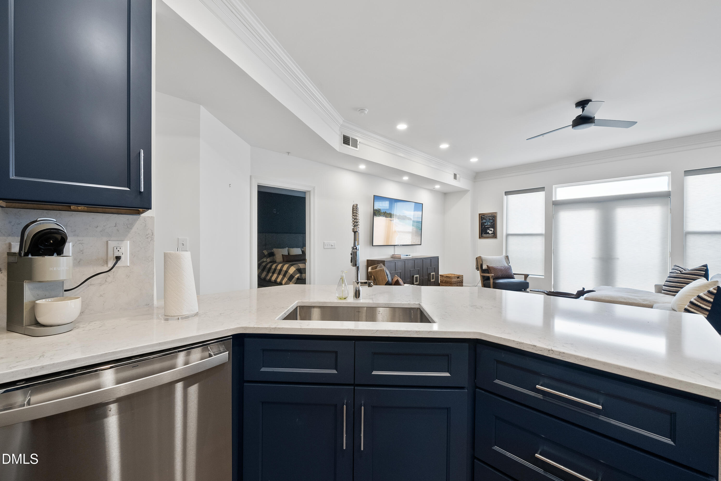 200 South Dawson Street, Unit 306 Raleigh, NC 27601 - Photo 8 of 24 a kitchen with sink and view of living room