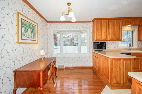 a very nice looking kitchen with a large window