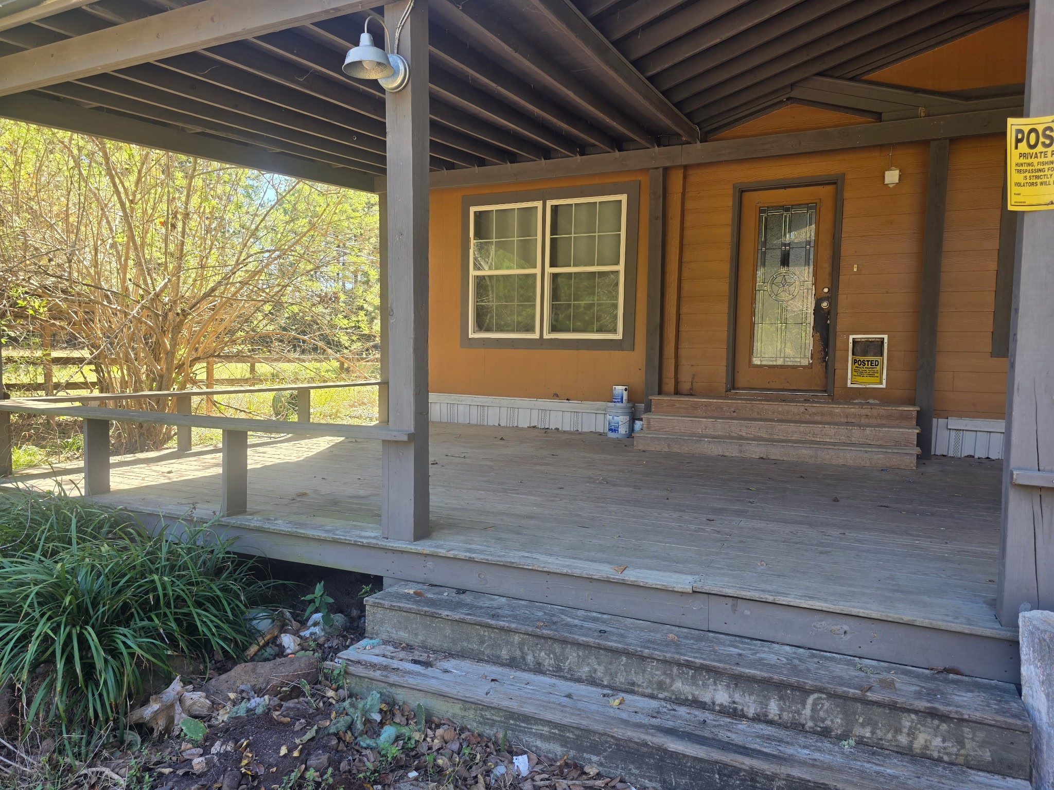 633 Ira Denson Road Coldspring, TX 77331 - Photo 4 of 27 a view of entrance gate of a house