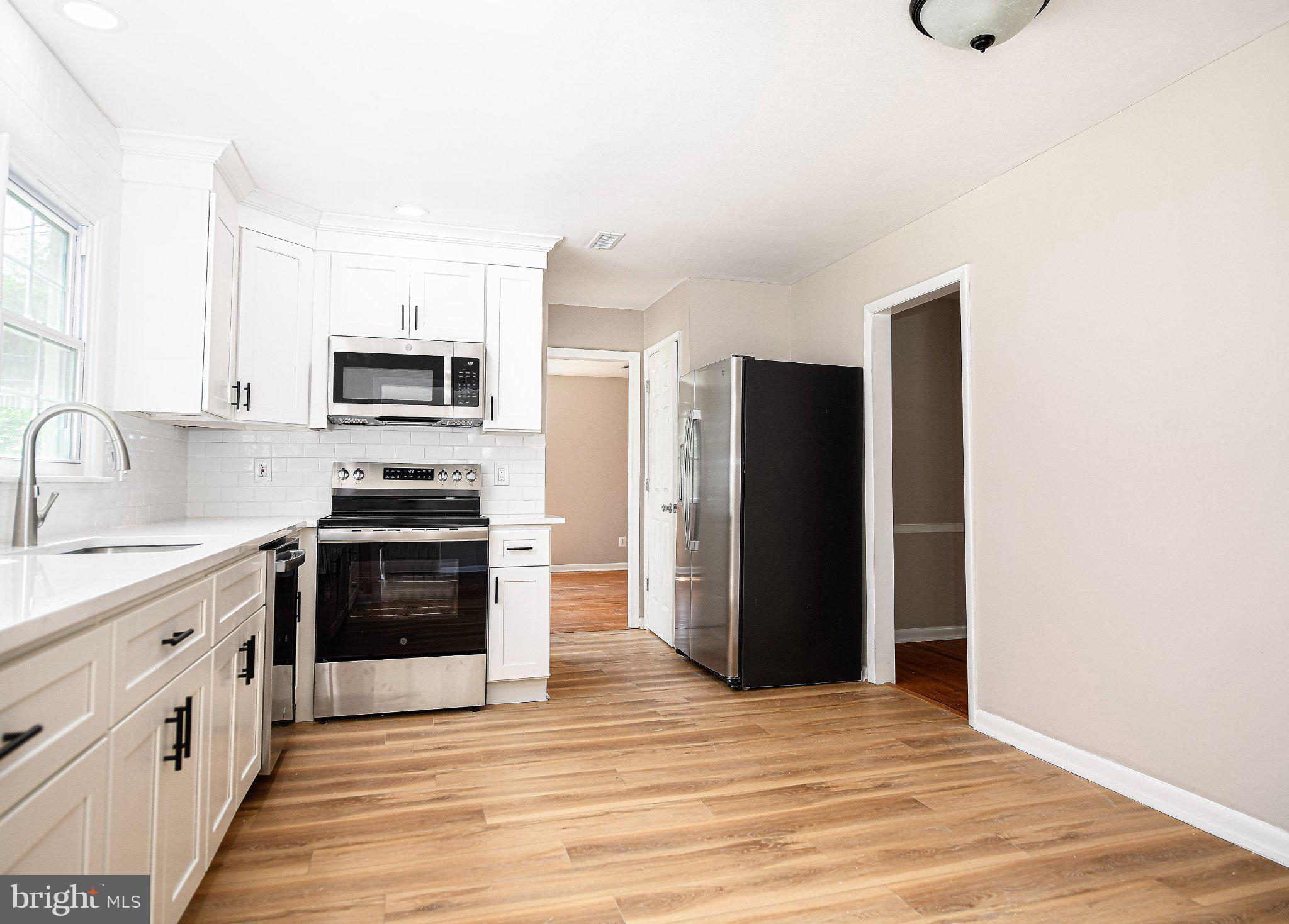 205 East Ring Factory Road Bel Air, MD 21014 - Photo 12 of 35 Brand new kitchen w/white cabinetry & quartz