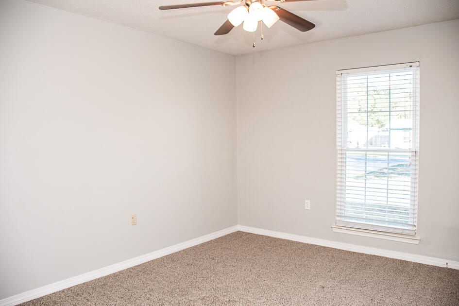 17 8th Avenue Shalimar, FL 32579 - Photo 13 of 25 an empty room with a window