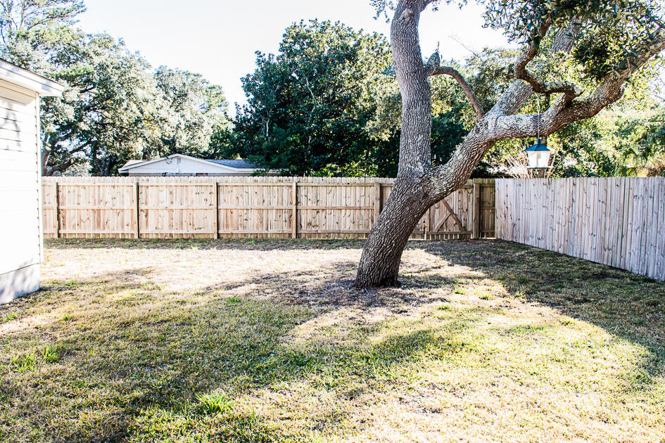 17 8th Avenue Shalimar, FL 32579 - Photo 23 of 25 a view of a yard with a tree