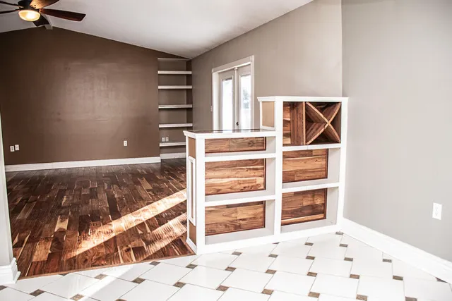 a room with a bed and a window