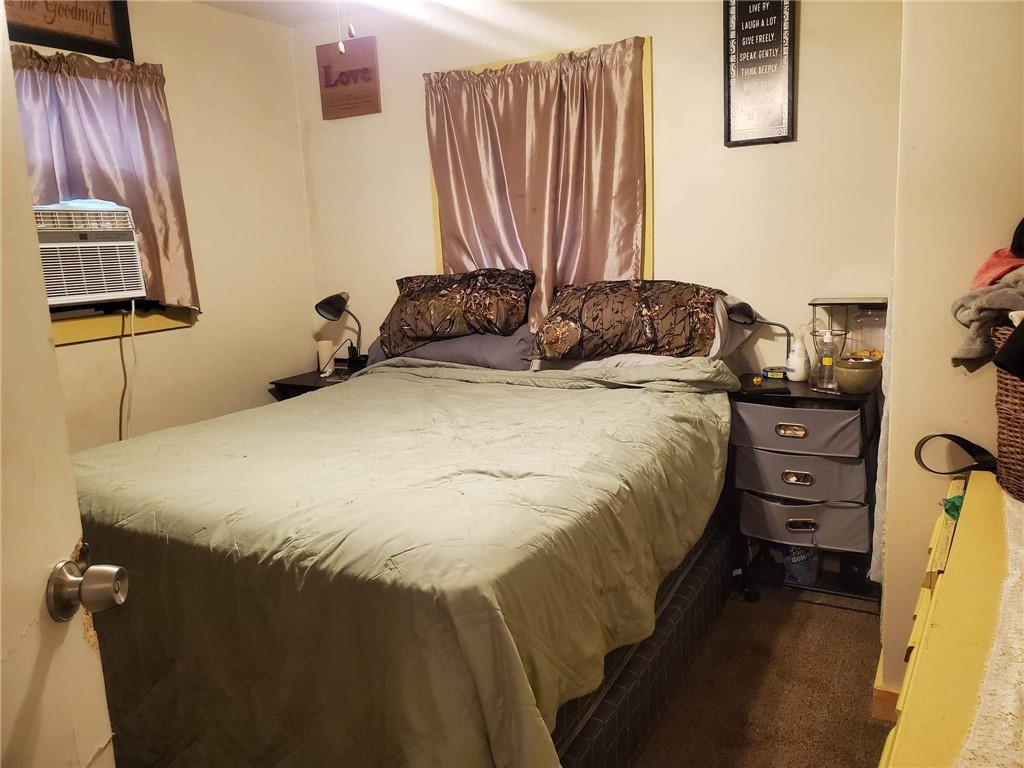 105 Febinger Alley Kittanning, PA 16201 - Photo 16 of 21 a bed sitting in a bedroom next to a window
