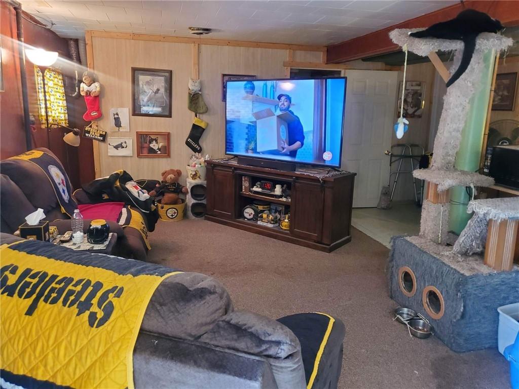 105 Febinger Alley Kittanning, PA 16201 - Photo 19 of 21 a living room with furniture and a flat screen tv