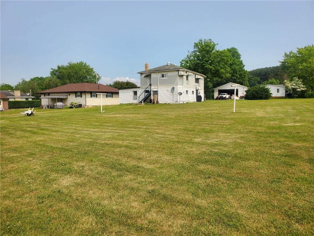 105 Febinger Alley Kittanning, PA 16201 - Photo 5 of 21 a front view of a house with a yard