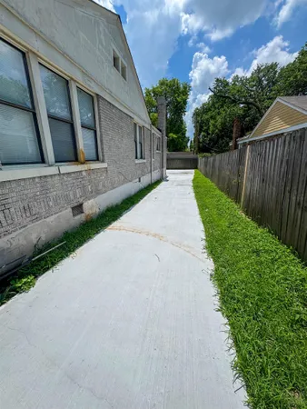 a view of backyard with green space