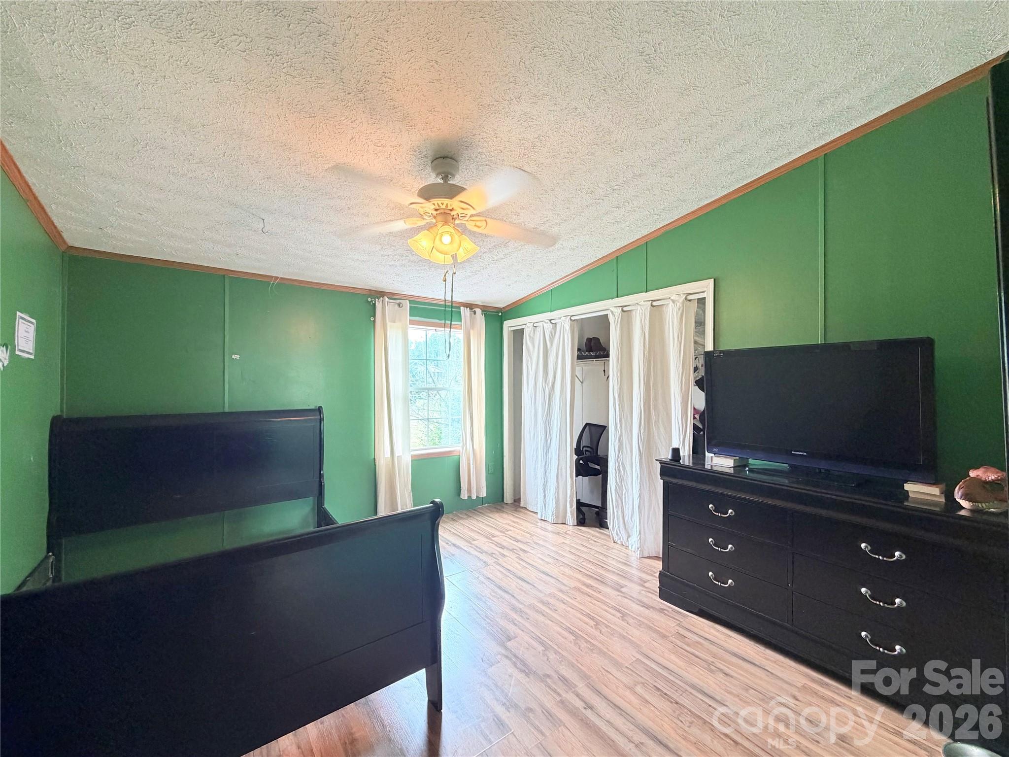 219 John E Randall Road Shelby, NC 28152 - Photo 15 of 21 a bedroom with a bed and television