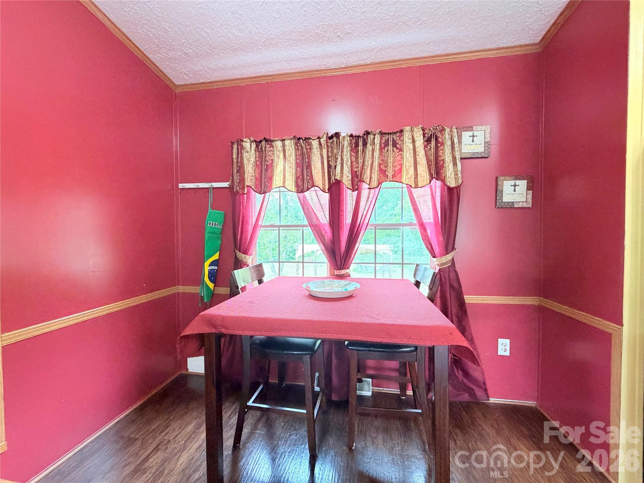 219 John E Randall Road Shelby, NC 28152 - Photo 10 of 21 a view of a dining room with furniture and wooden floor