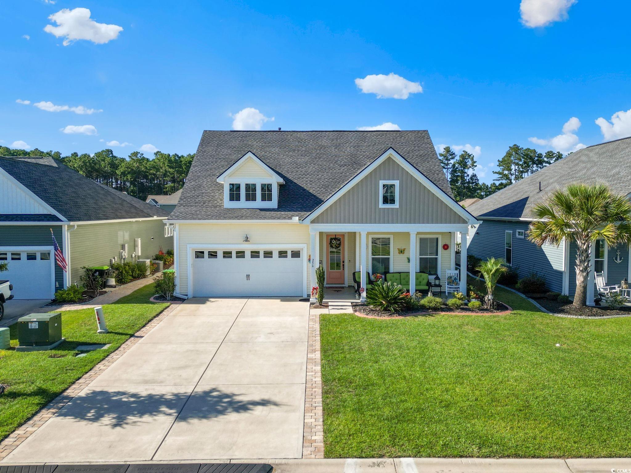 256 Yellow Rail Street Murrells Inlet, SC 29576 - Photo 1 of 40 View of front of property featuring a garage, a po