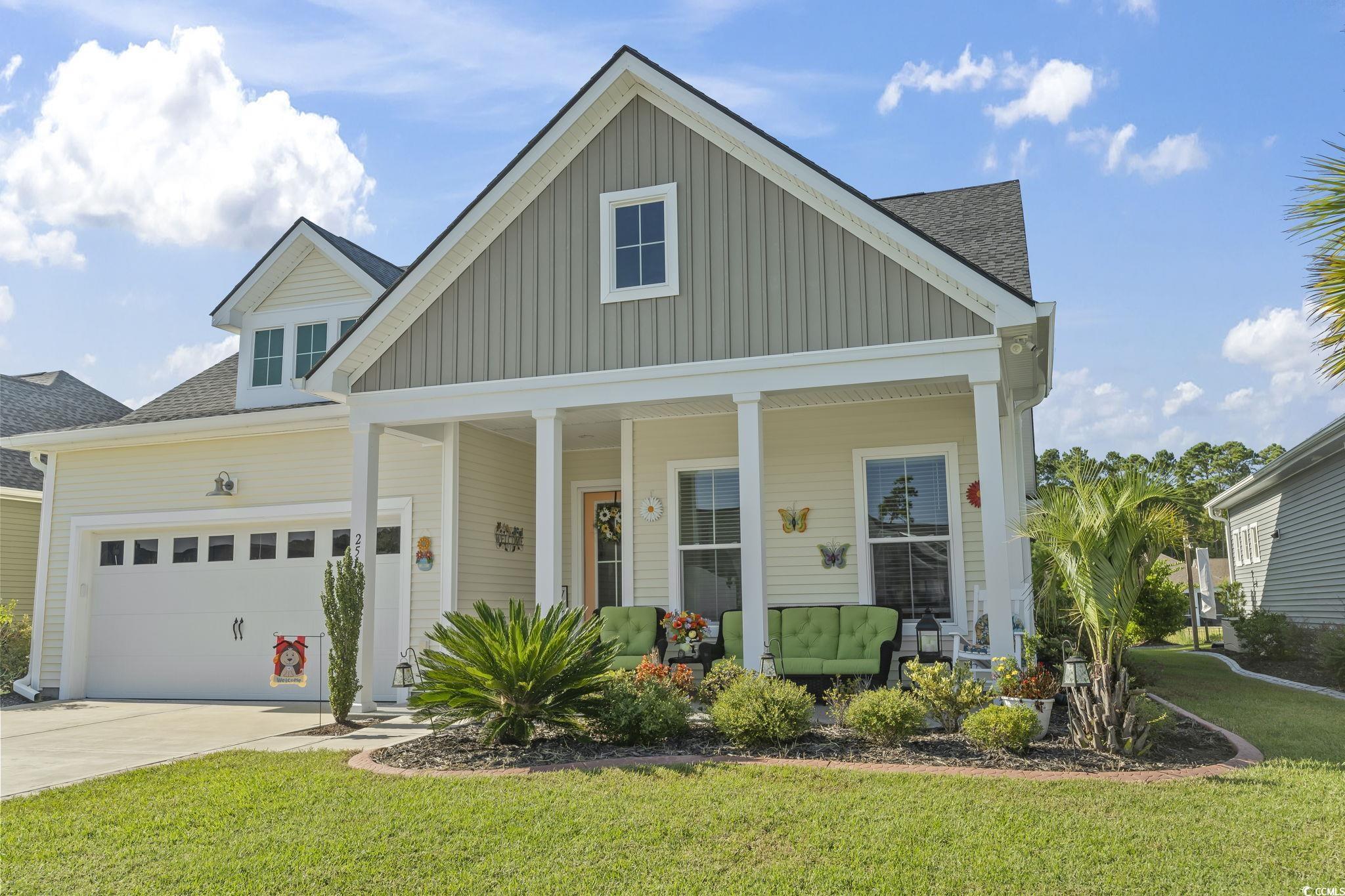 256 Yellow Rail Street Murrells Inlet, SC 29576 - Photo 3 of 40 View of front facade with a garage, a front lawn,