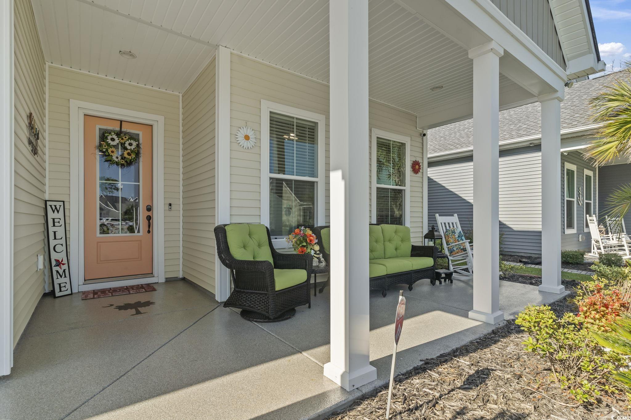 256 Yellow Rail Street Murrells Inlet, SC 29576 - Photo 4 of 40 Property entrance featuring covered porch
