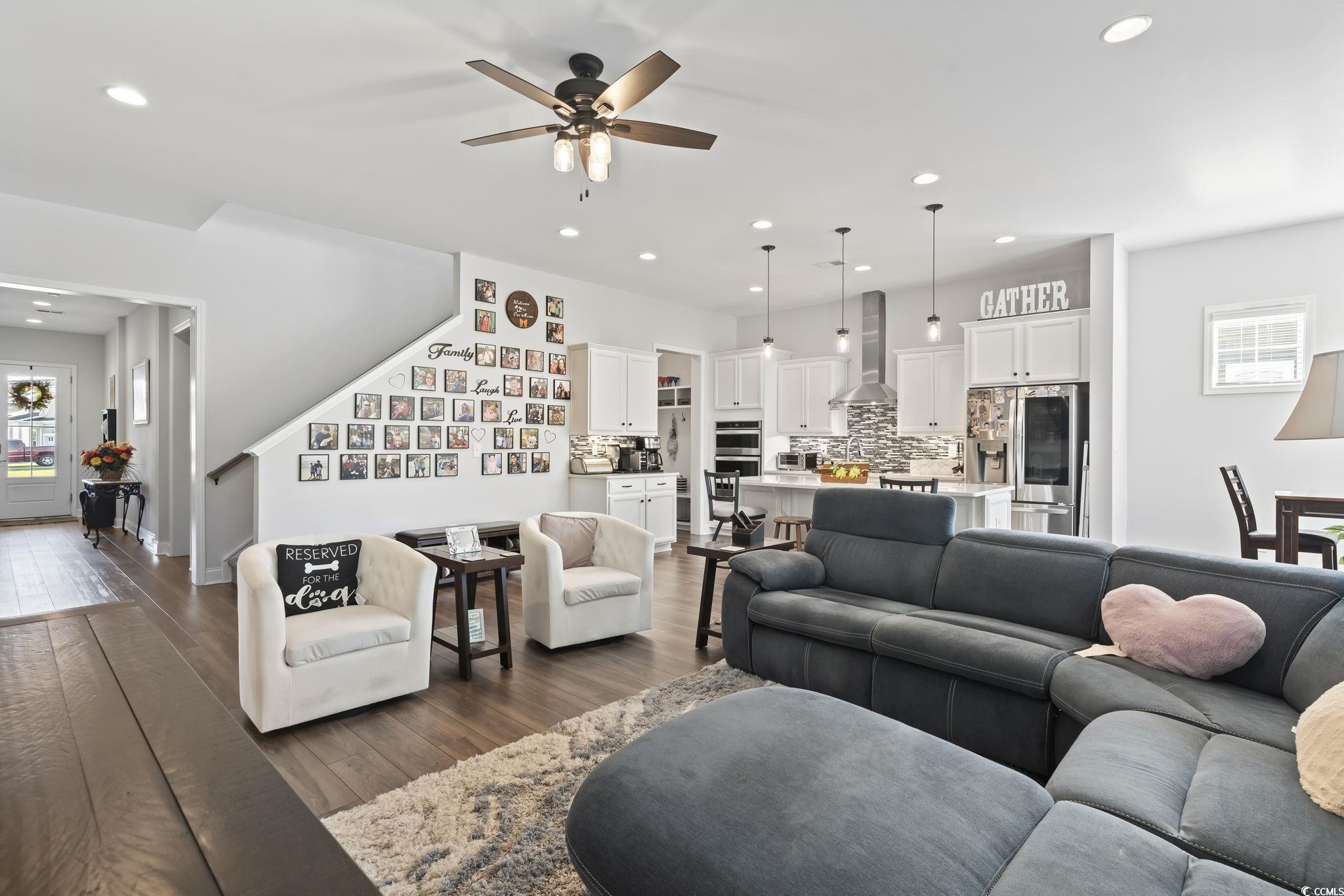 256 Yellow Rail Street Murrells Inlet, SC 29576 - Photo 10 of 40 Living room with dark hardwood / wood-style floori
