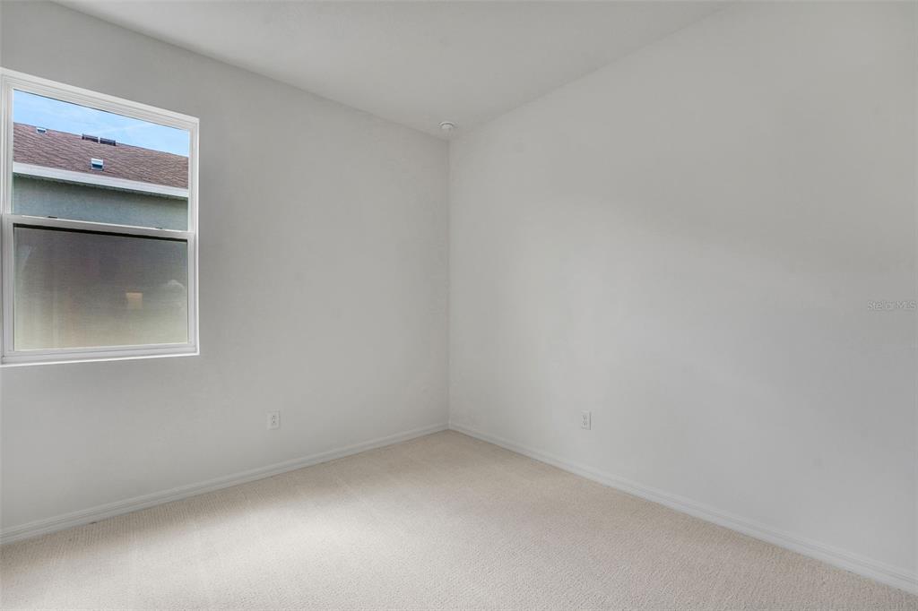 35163 Tuscan Hill Road Dade City, FL 33525 - Photo 15 of 45 a view of an empty room