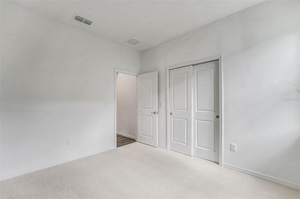 35163 Tuscan Hill Road Dade City, FL 33525 - Photo 16 of 45 a view of an empty room