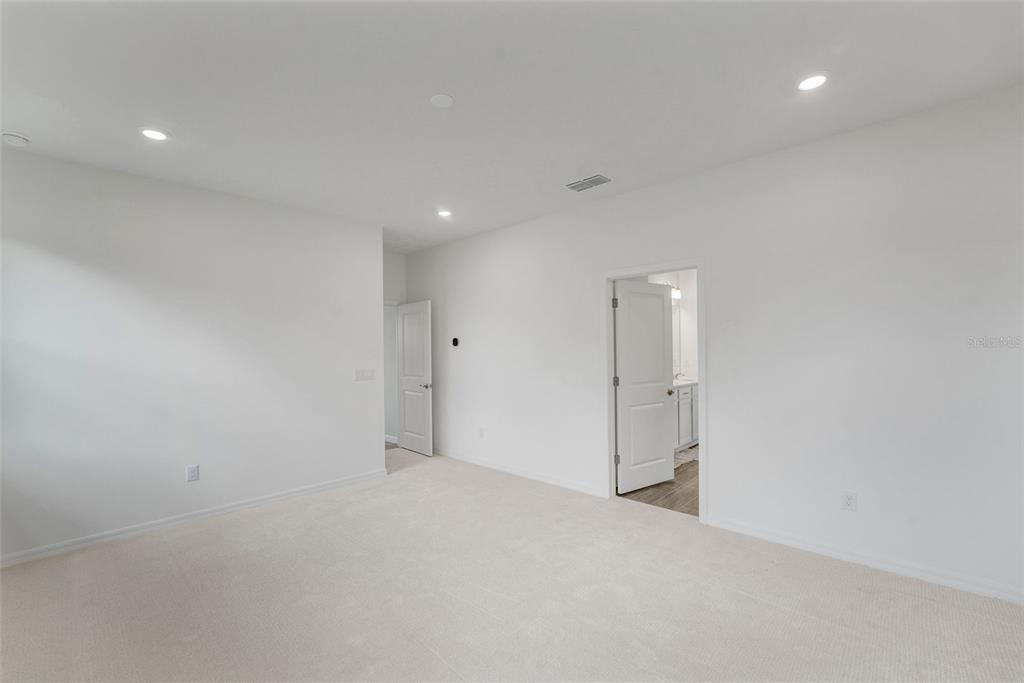 35163 Tuscan Hill Road Dade City, FL 33525 - Photo 30 of 45 a view of an empty room