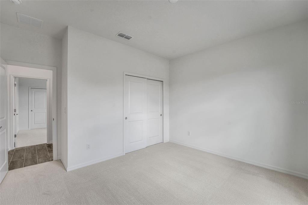 35163 Tuscan Hill Road Dade City, FL 33525 - Photo 9 of 45 a view of an empty room