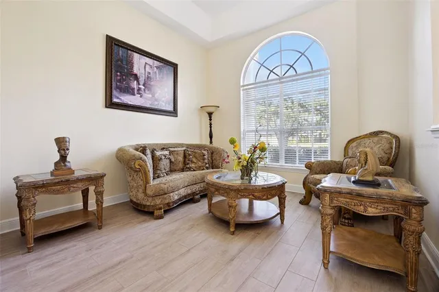 a living room with furniture and a window