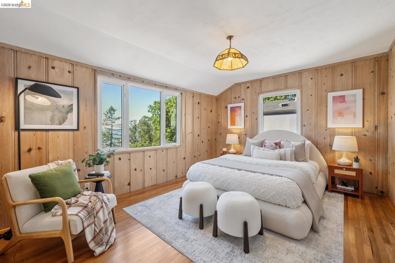 155 Avenida Drive Berkeley, CA 94708 - Photo 40 of 86 Wood paneling throughout, hardwood flooring, white window frames, and a textured white ceiling