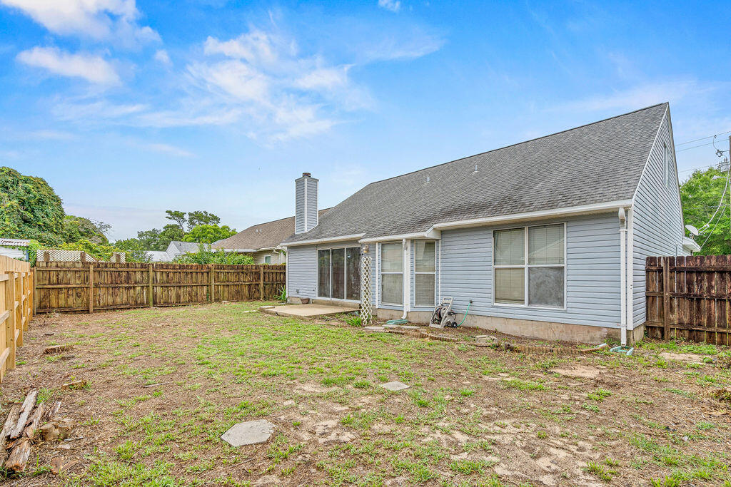 53 4th Street Shalimar, FL 32579 - Photo 36 of 47 a backyard of a house