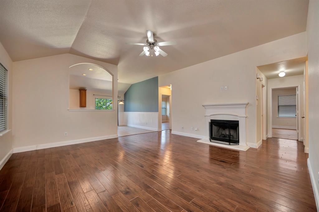 3909 Long Hollow Road Fort Worth, TX 76262 - Photo 3 of 20 Open XL living with fireplace