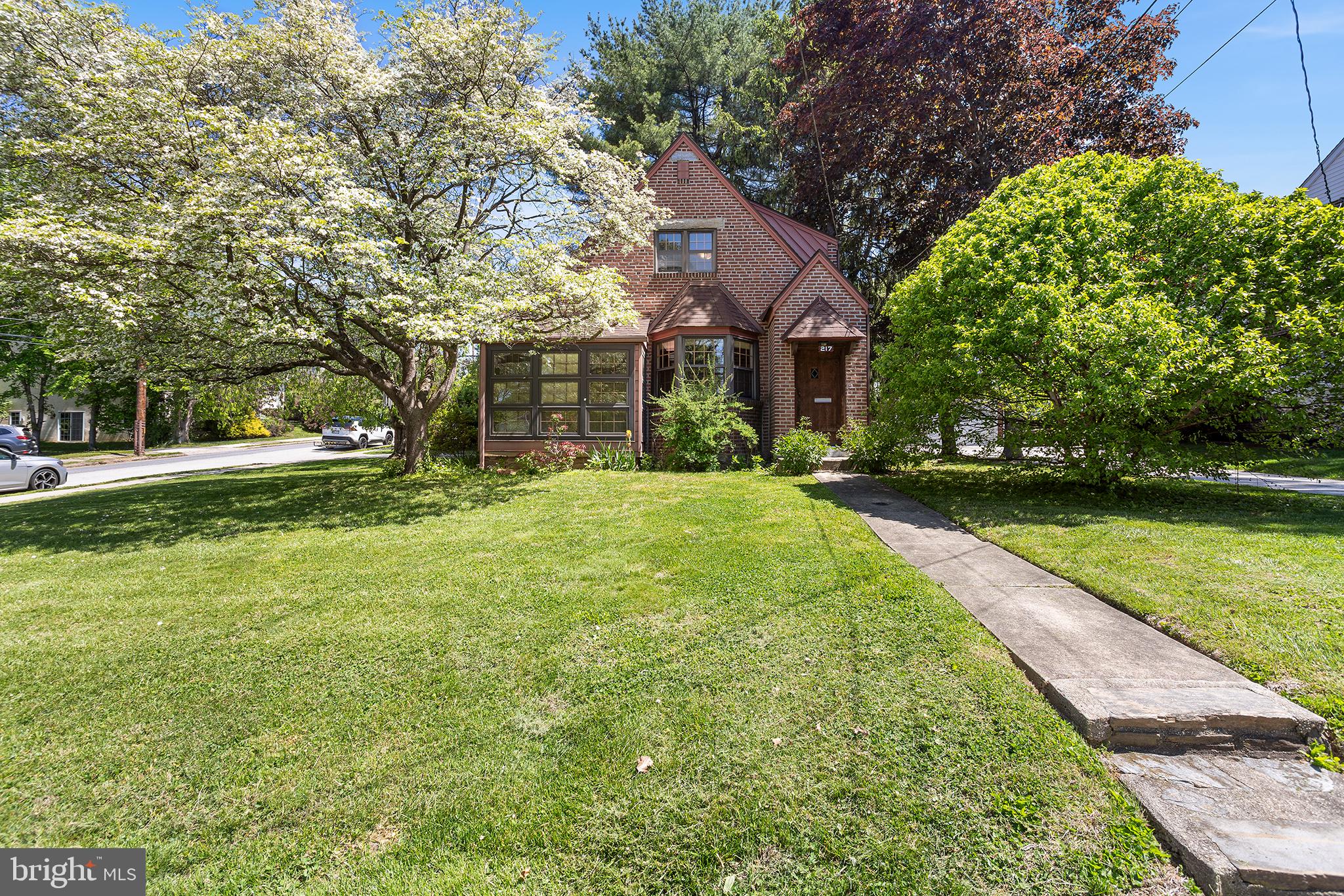 217 East Thomson Avenue Springfield, PA 19064 - Photo 2 of 32 a view of a house with a yard