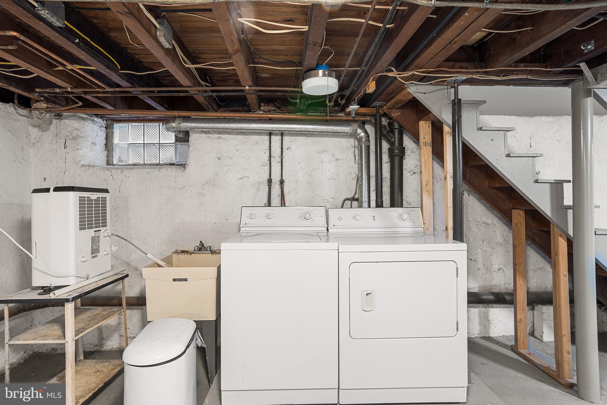 217 East Thomson Avenue Springfield, PA 19064 - Photo 29 of 32 a utility room with dryer and washer