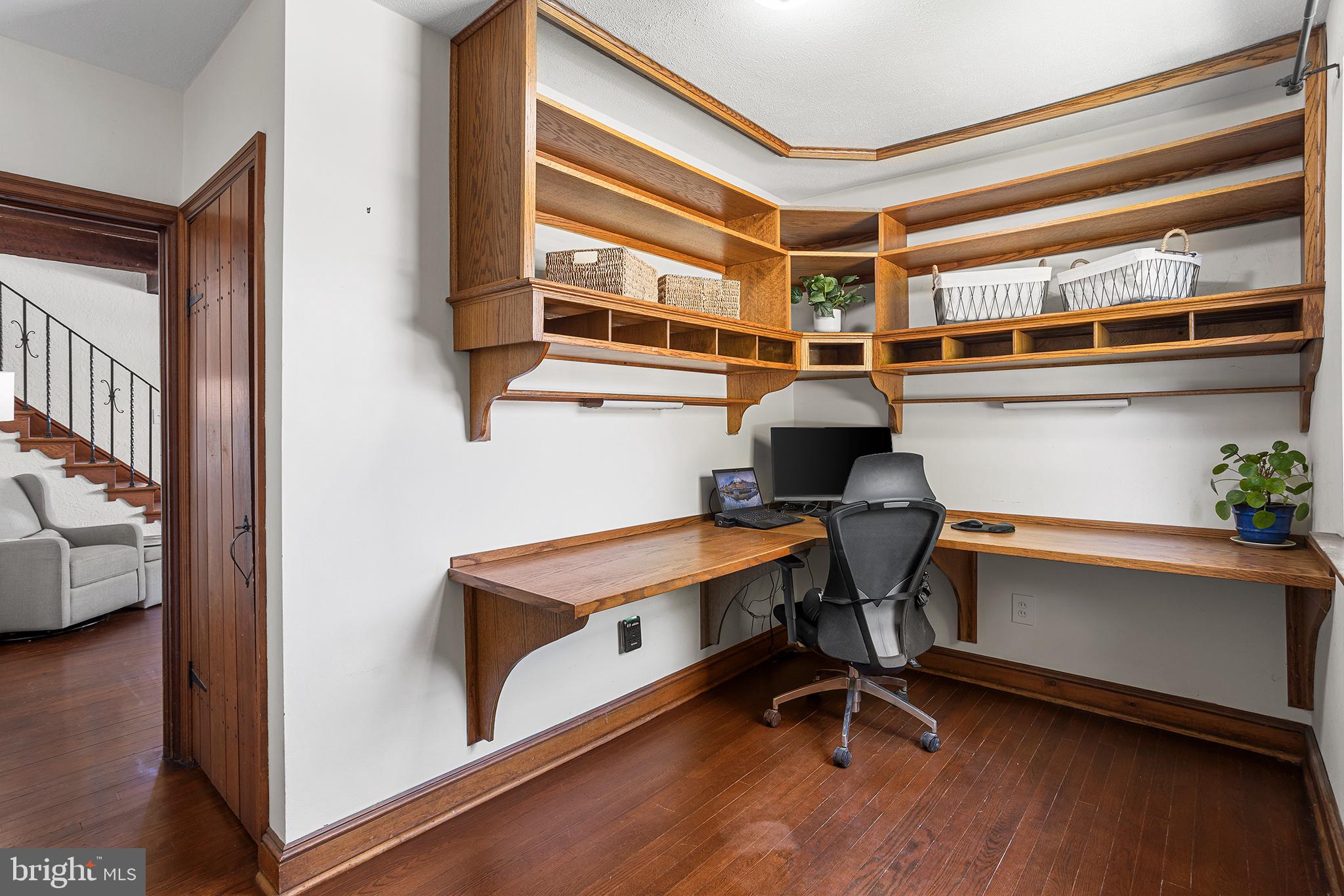 217 East Thomson Avenue Springfield, PA 19064 - Photo 7 of 32 a view of a workspace with furniture and a window