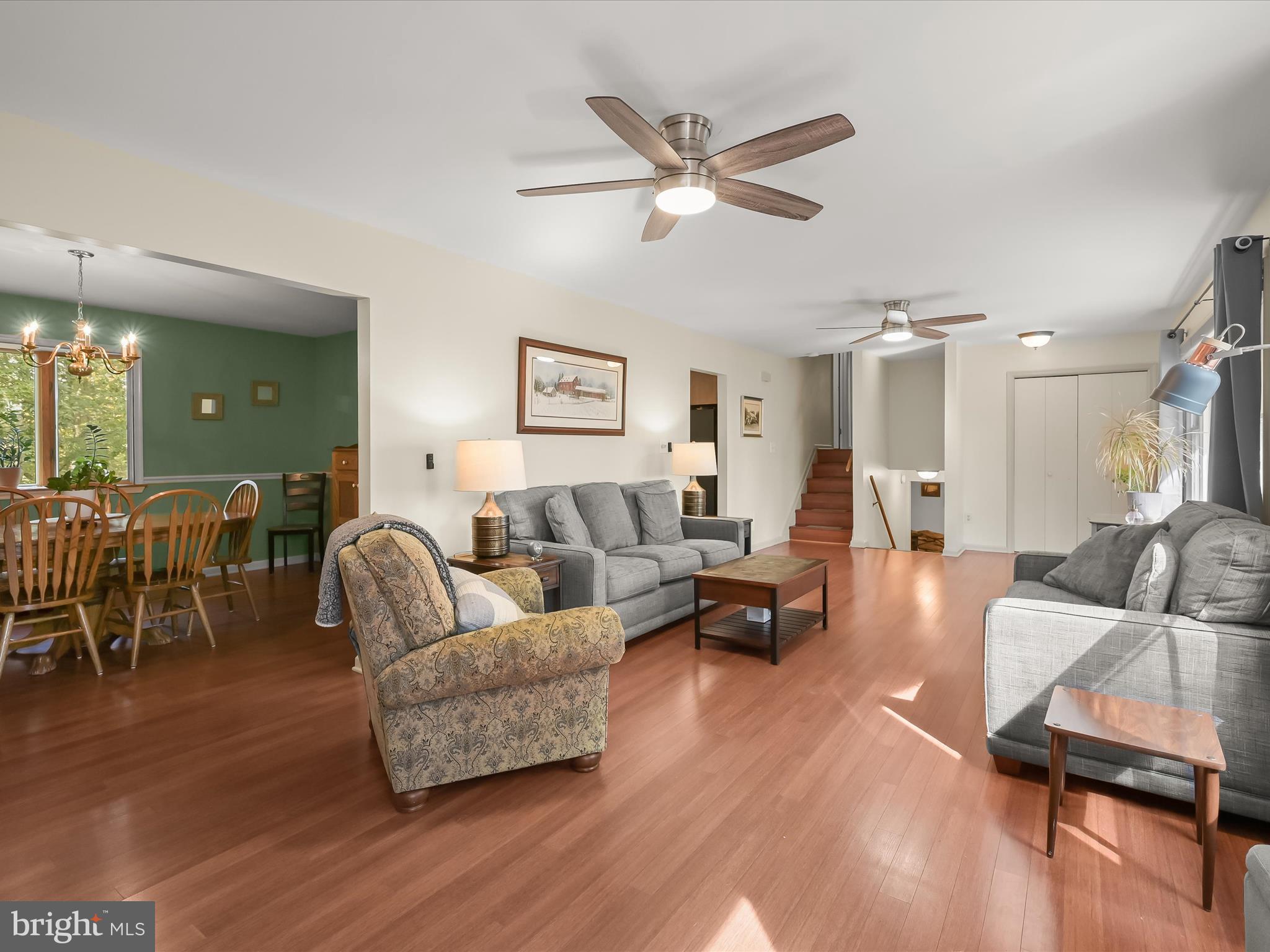 4950 Fleming Road Mount Airy, MD 21771 - Photo 12 of 64 a living room with furniture wooden floor and a ceiling fan