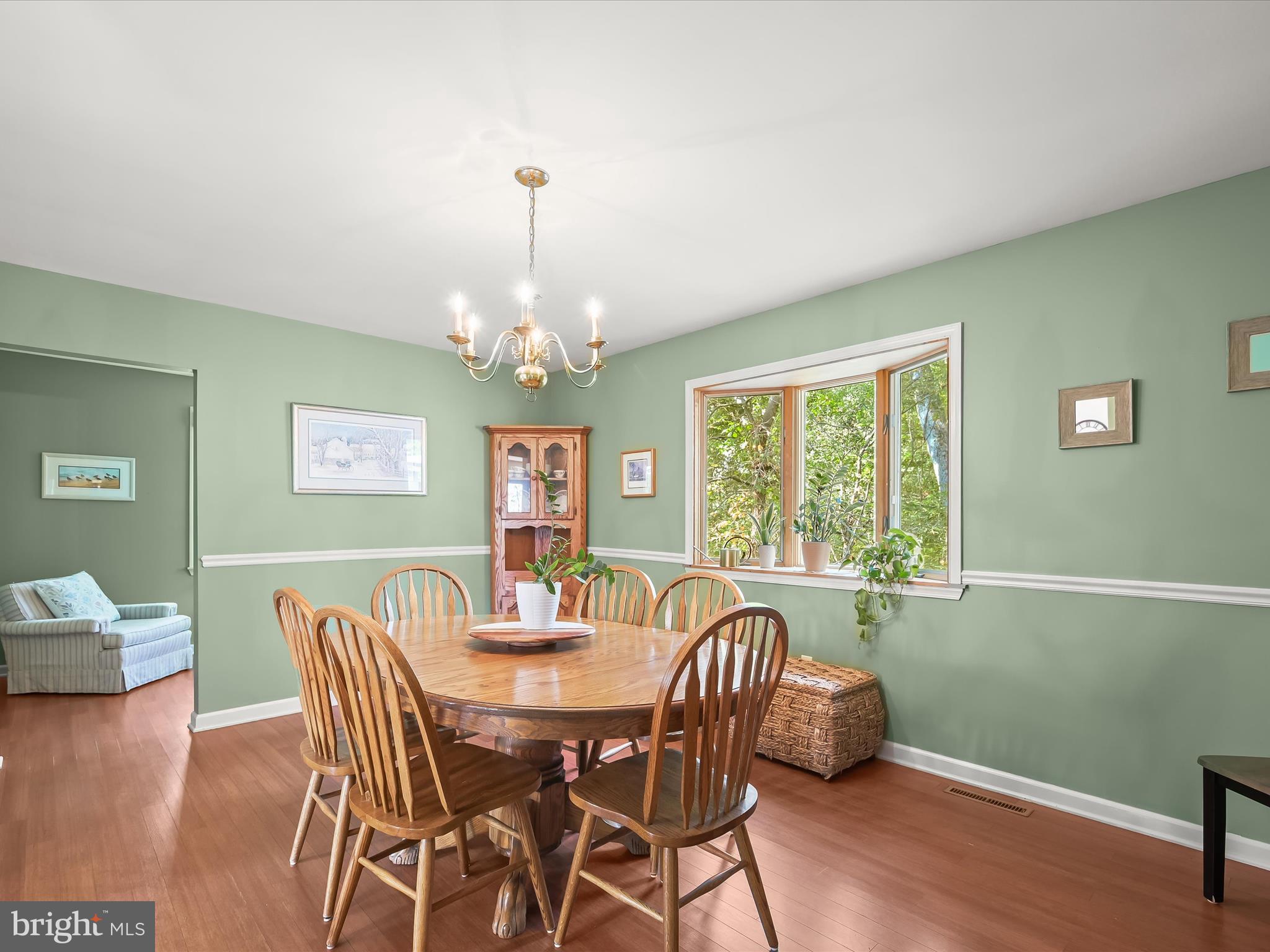 4950 Fleming Road Mount Airy, MD 21771 - Photo 13 of 64 a view of a dining room with furniture window and wooden floor