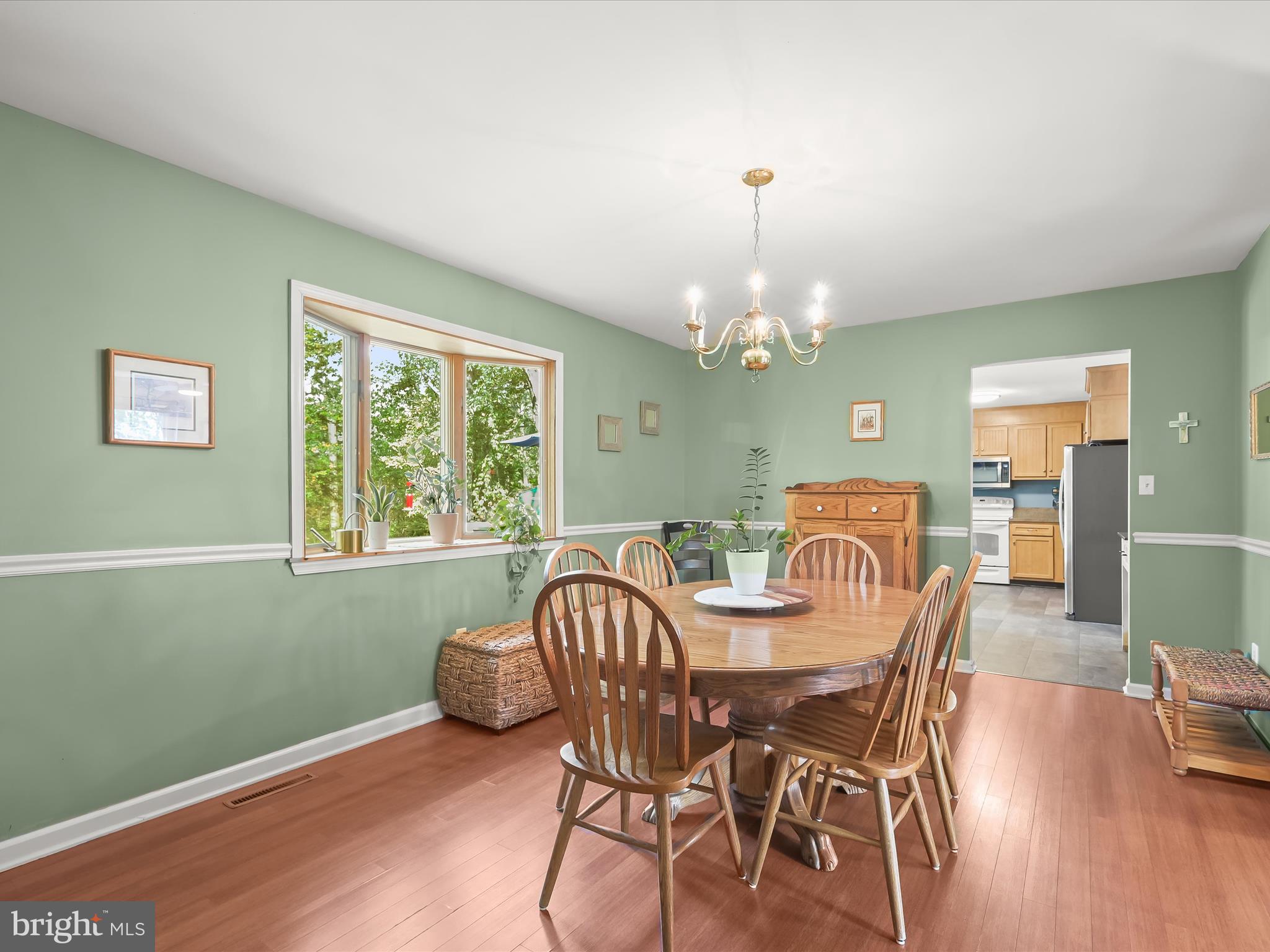 4950 Fleming Road Mount Airy, MD 21771 - Photo 15 of 64 a view of a dining room with furniture window and wooden floor