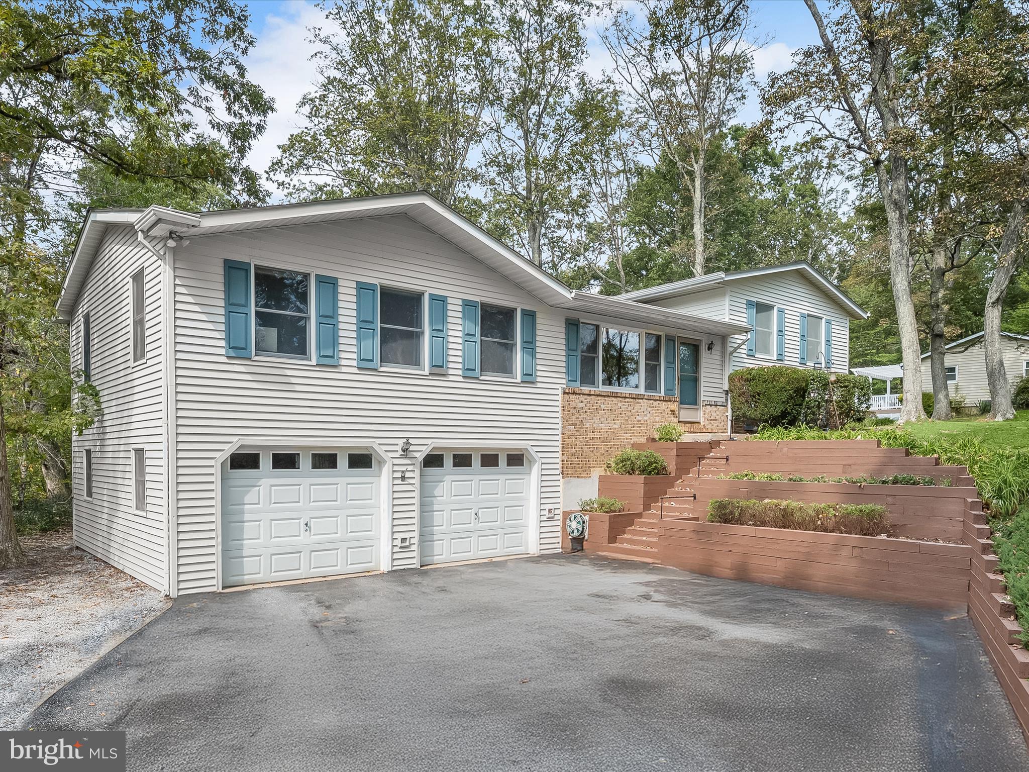 4950 Fleming Road Mount Airy, MD 21771 - Photo 2 of 64 a front view of a house with a yard