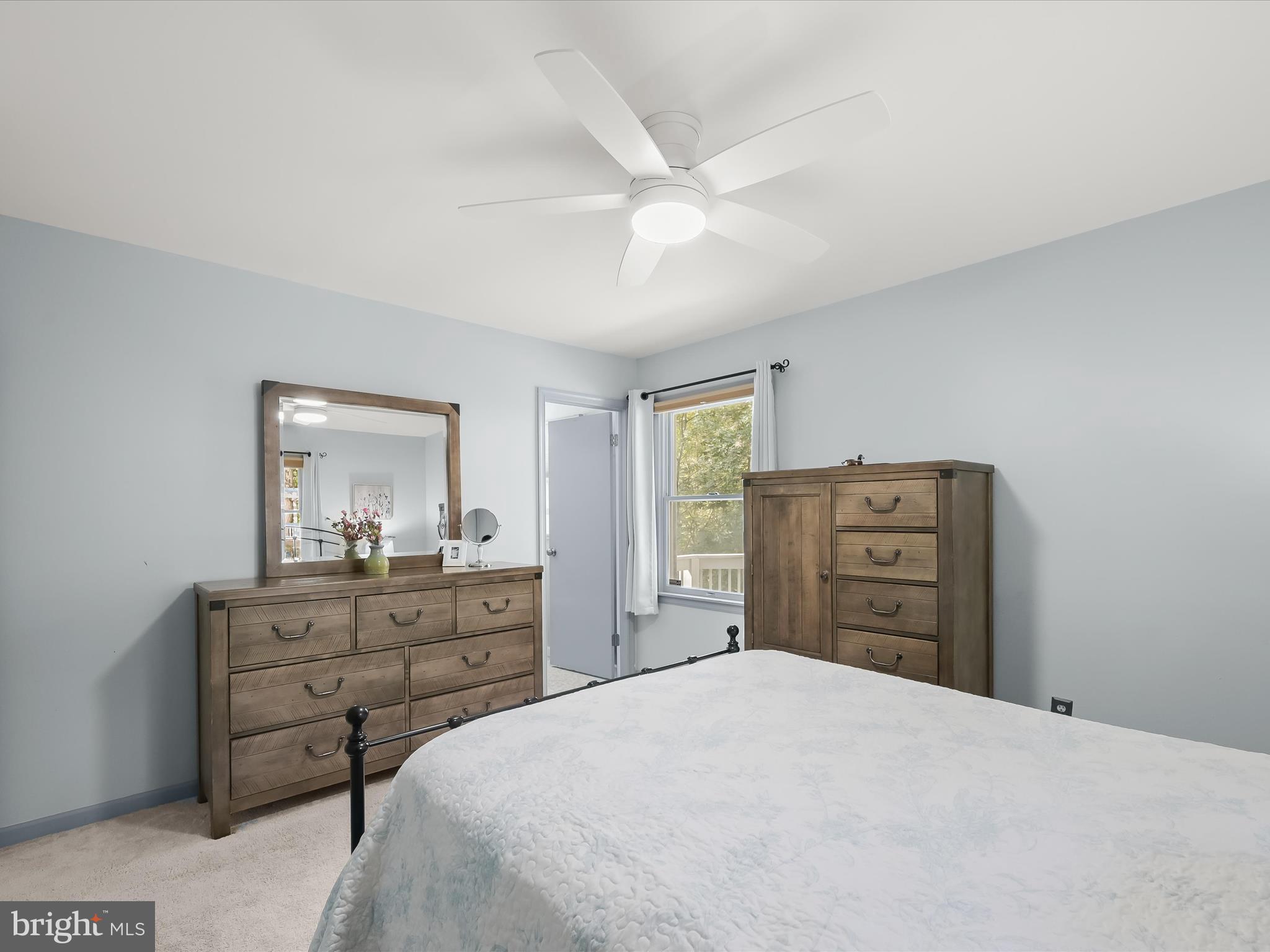 4950 Fleming Road Mount Airy, MD 21771 - Photo 27 of 64 a bedroom with a bed and a dresser