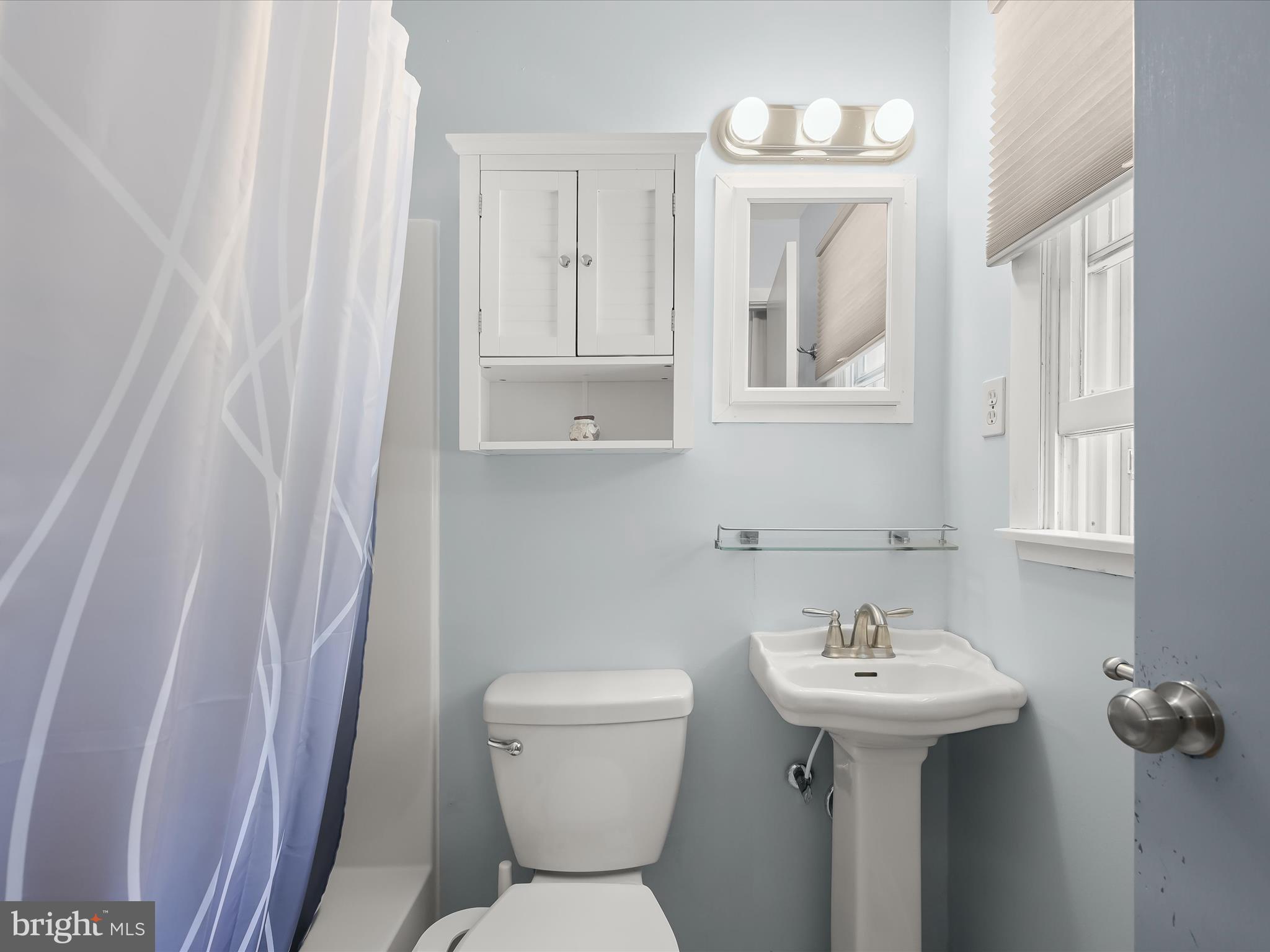 4950 Fleming Road Mount Airy, MD 21771 - Photo 29 of 64 a bathroom with a sink toilet and mirror