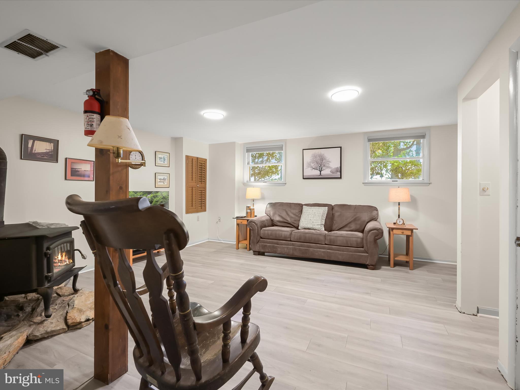 4950 Fleming Road Mount Airy, MD 21771 - Photo 35 of 64 a living room with furniture and wooden floor